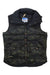 The Powderhorn Men's The Original Vest is a sleeveless, down insulated vest in dark green camo with brown buttons and a high collar. Made from recycled polyester, it features a Powderhorn label on the lower left and an inner collar logo tag.