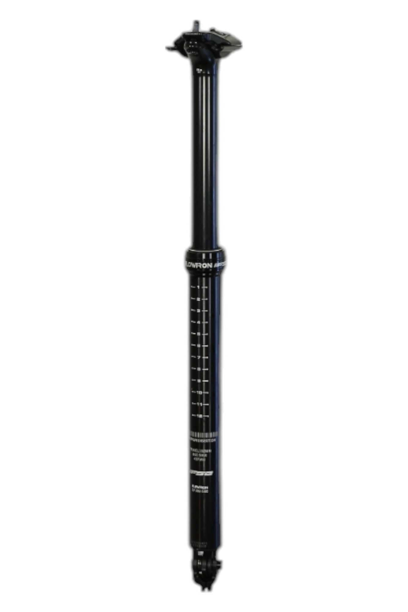 The Full Speed Ahead Flowtron Adjustable Seatpost is a black bicycle seatpost with white measurement markings, cycling comfort adjustment controls, and a top saddle clamp, shown against a white background.