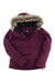 The Tuscany II Jacket in maroon features a faux fur-lined hood, front zipper and snap closures, and a quilted design. Stylishly displayed flat with one sleeve slightly bent.