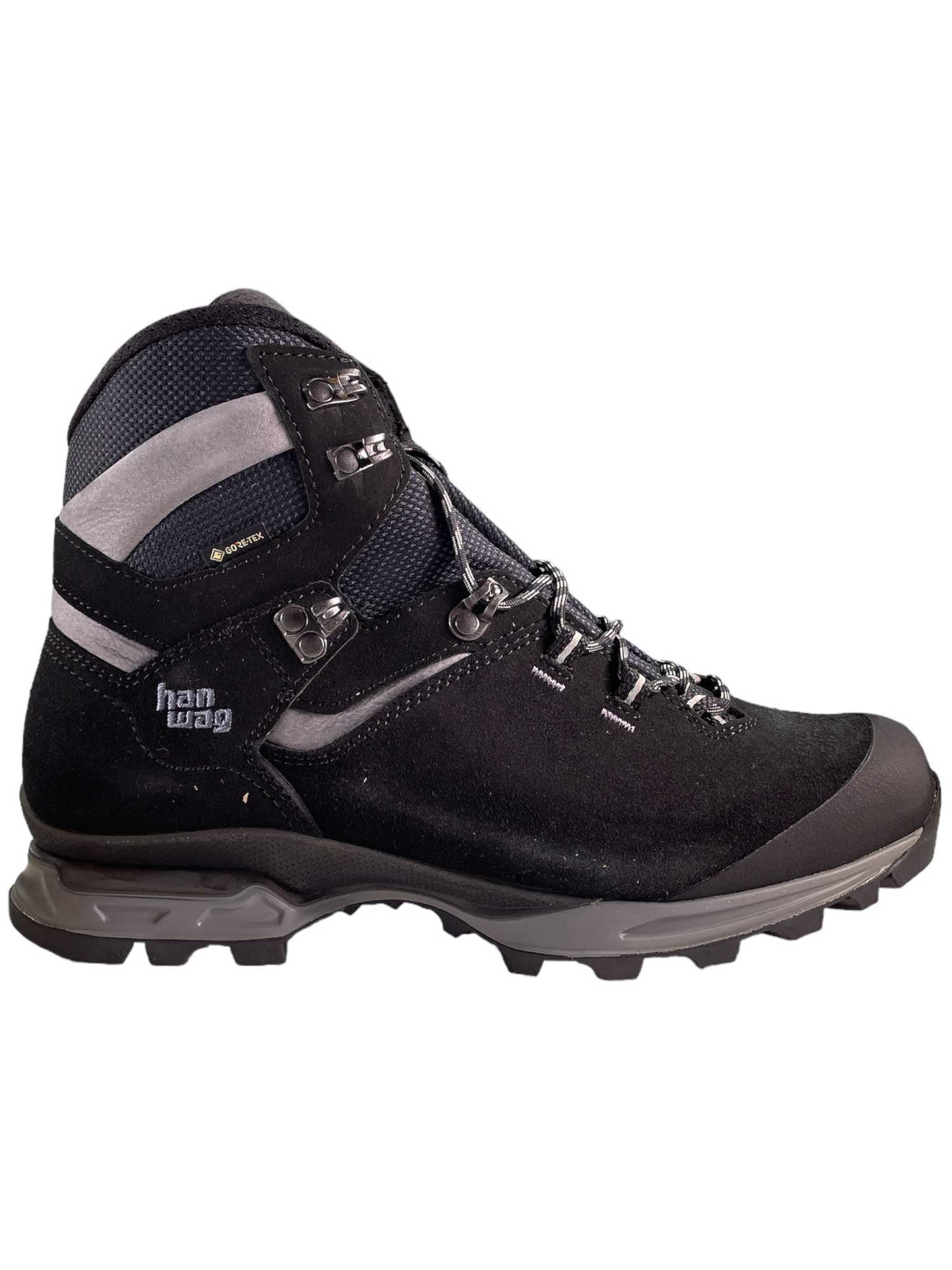 The Hanwag Men's Tatra Light GTX Boot is shown in black with gray accents, metal eyelets, and a rugged Vibram sole. Featuring GORE-TEX waterproofing, this durable boot offers comfort for any trail.