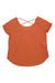 The Craft Sportswear Womens Core Charge Cross Back Tee is an orange, short-sleeve training top for women with a scoop neckline and crisscross strap detail on the back, shown laid flat on a white background.