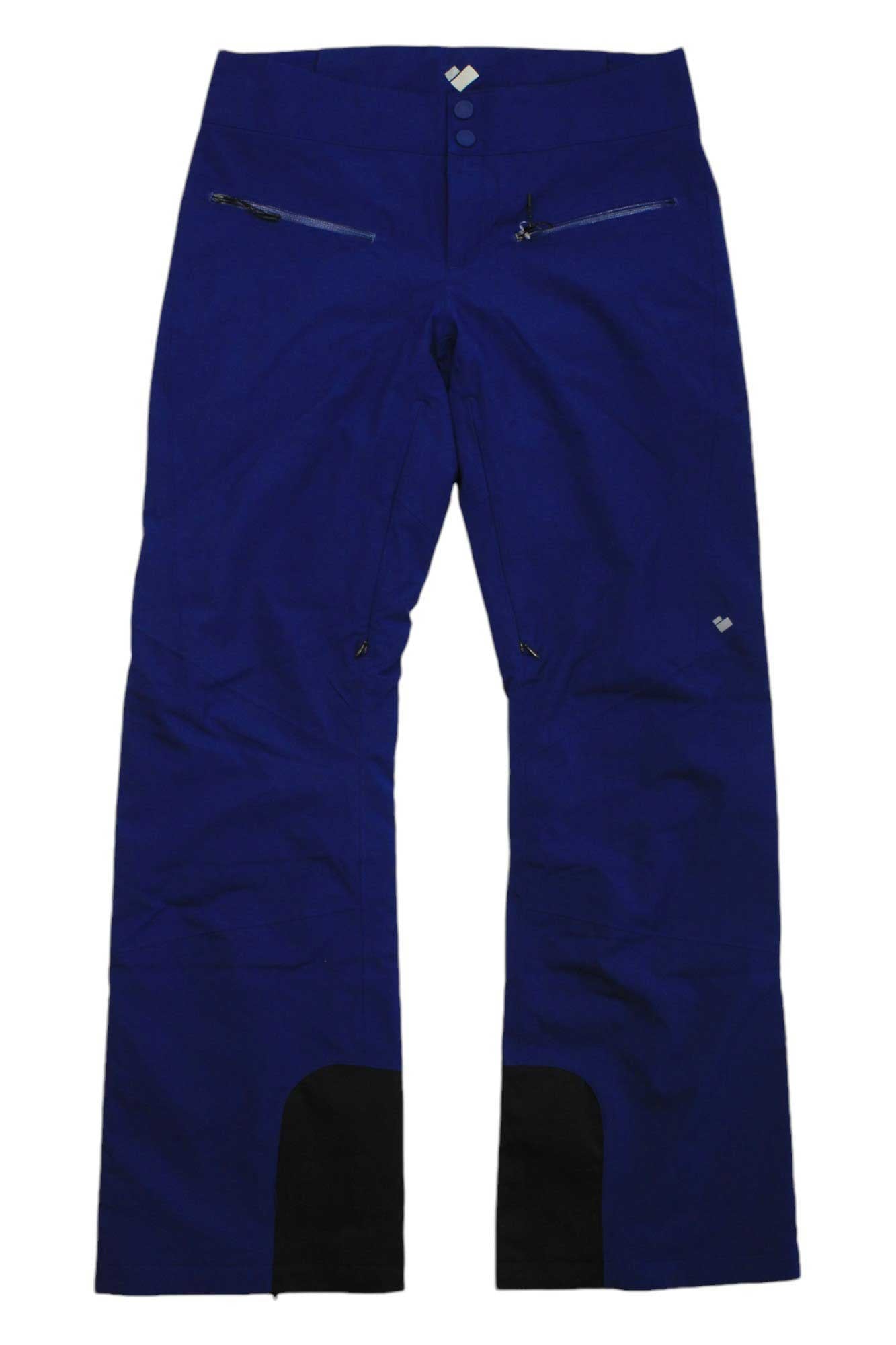 The Obermeyer Womens Bliss Pant, shown flat on a white background, features bright blue fabric, black ankle patches, two front zippered pockets, and waist button closures.