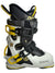 The Dahu Womens Ecorce 01 X Limited Edition W90 Flex Ski Boot is a white and black all-mountain alpine boot with yellow buckles, a high cuff, adjustable straps, and ergonomic padding for comfort and performance.