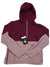 The Outdoor Research Womens Ferrosi Anorak is a lightweight, water-resistant nylon jacket with a two-tone burgundy and light mauve design. It features a half-zip front, elastic cuffs, and an OR logo at the hem for functional style.