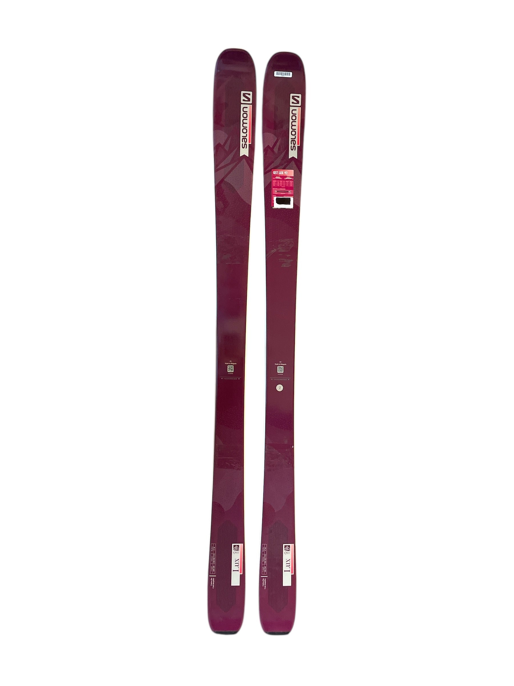 A pair of Salomon Womens QST Lux 92 Skis - 2022 in maroon with white and black branding are displayed side by side on a white background, highlighting versatile all-mountain performance for women.