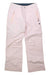 Obermeyer Brooke Insulated Snow Pants in light pink for girls feature front zipper and button closure, two zippered pockets with peach accents, subtle stitched detailing, a relaxed fit, and are shown laid flat on a white background.