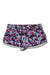 The Speedo Womens Printed Coverup Short features an abstract hexagon print in pink, purple, blue, black, and white, UPF 50+ sun protection, elastic waistband, and curved hems—ideal as a stylish women's athletic coverup.