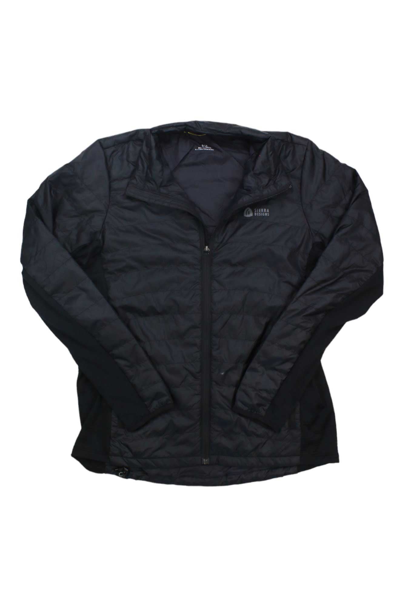 The Sierra Designs Womens Tuolumne Sweater is a black, long-sleeve ultralight packable jacket with a front zipper and a small logo on the left chest, shown laid flat on a white background.