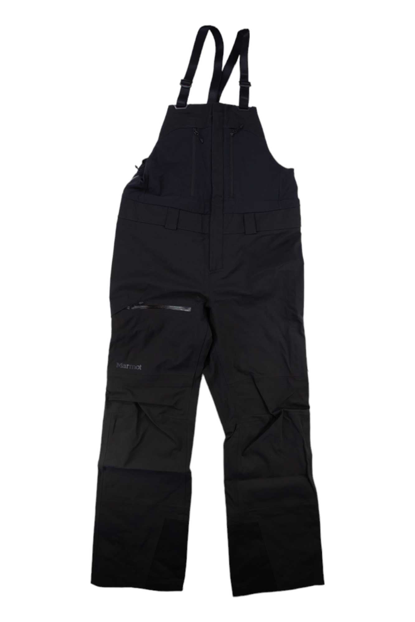 The Marmot Womens Refuge Pro Bib, made from recycled polyester, has adjustable shoulder straps, a front zipper, and several pockets. Shown laid flat on a white background, these waterproof bib pants are perfect for outdoor activities.