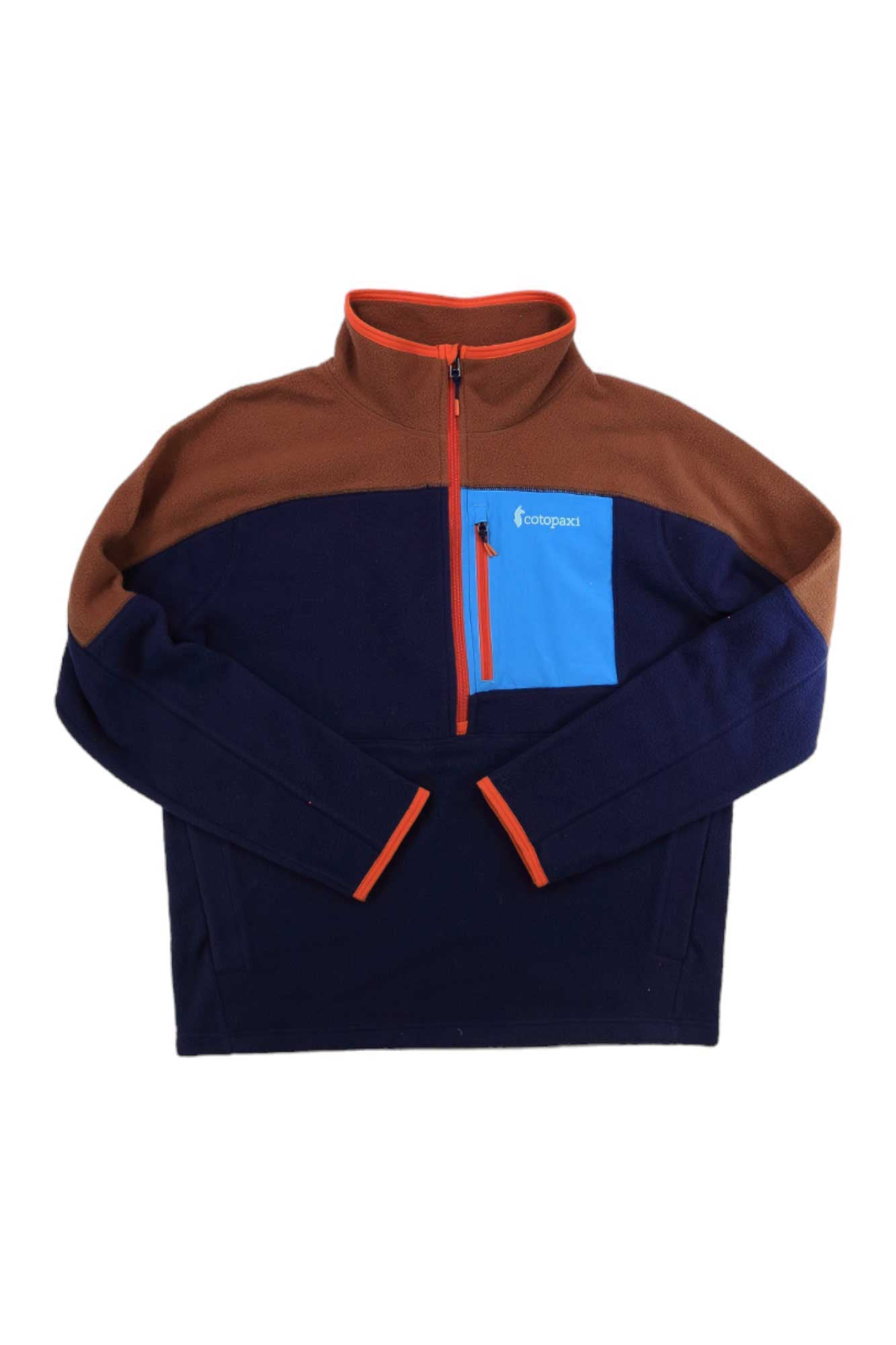 The Cotopaxi Mens Abrazo Half-Zip Fleece Jacket is made with recycled polyester and features a brown upper, navy lower, blue chest pocket, orange zipper and trim, plus long sleeves and a stand-up collar.