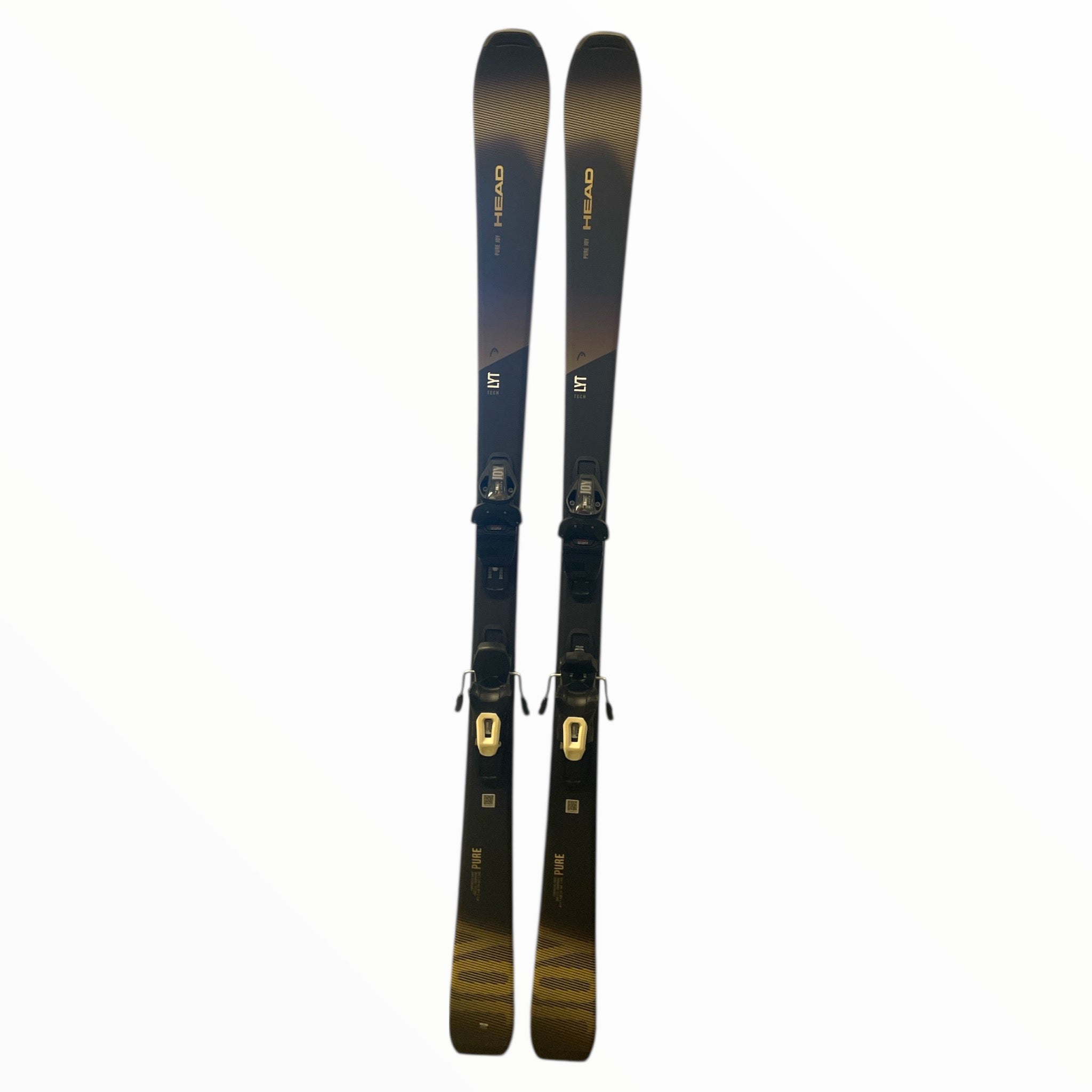 A pair of 2023 Head Pure Joy Womens Skis with Head Joy 9 GW Demo Bindings, shown on a white background, featuring black color with subtle gold and tan accents near the tips and tails.