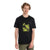 A man with curly hair stands facing the camera in an untucked Icebreaker Mens Merino 150 Tech Lite II Peak Grid SS Tee featuring a neon green mountain graphic, paired with olive green pants against a plain white background—ideal for hiking.
