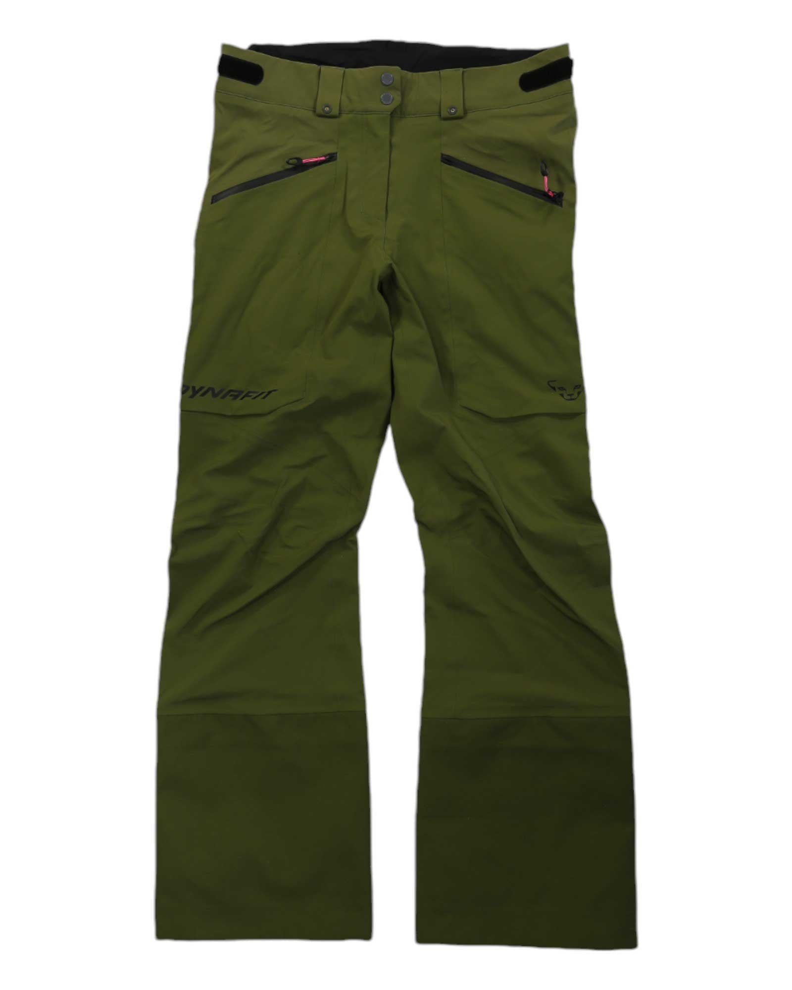 The Dynafit Women's Beast Hybrid Pant in olive green features stretch softshell fabric, zippered pockets, belt loops, black accents, subtle leg branding, and a water-repellent finish. Displayed flat on a white background.