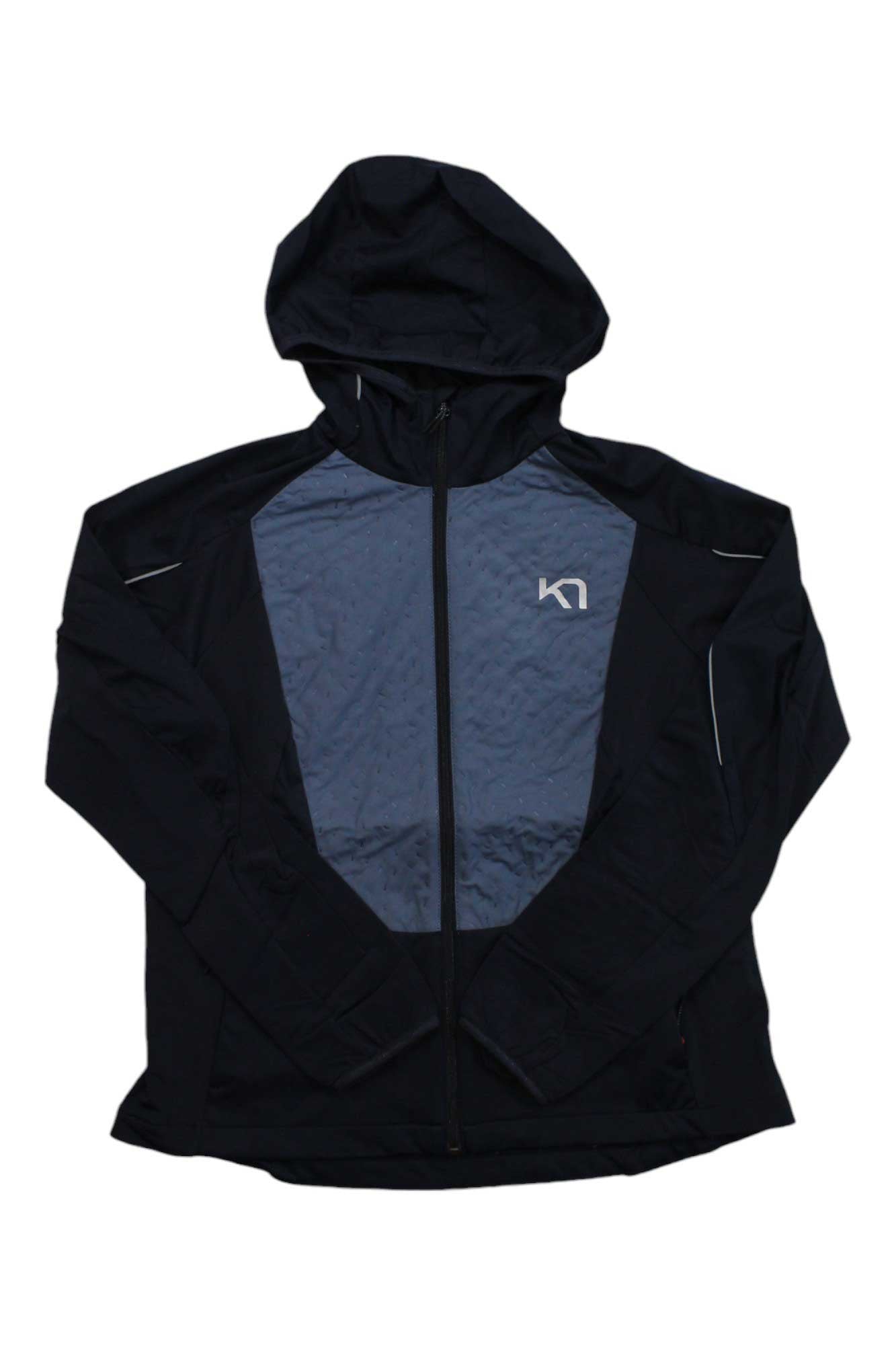 The Kari Traa Women’s Tirill 2.0 Jacket in black features a blue-gray front panel, a small white logo on the left chest, and is made from recycled polyester. It is shown flat against a white background.