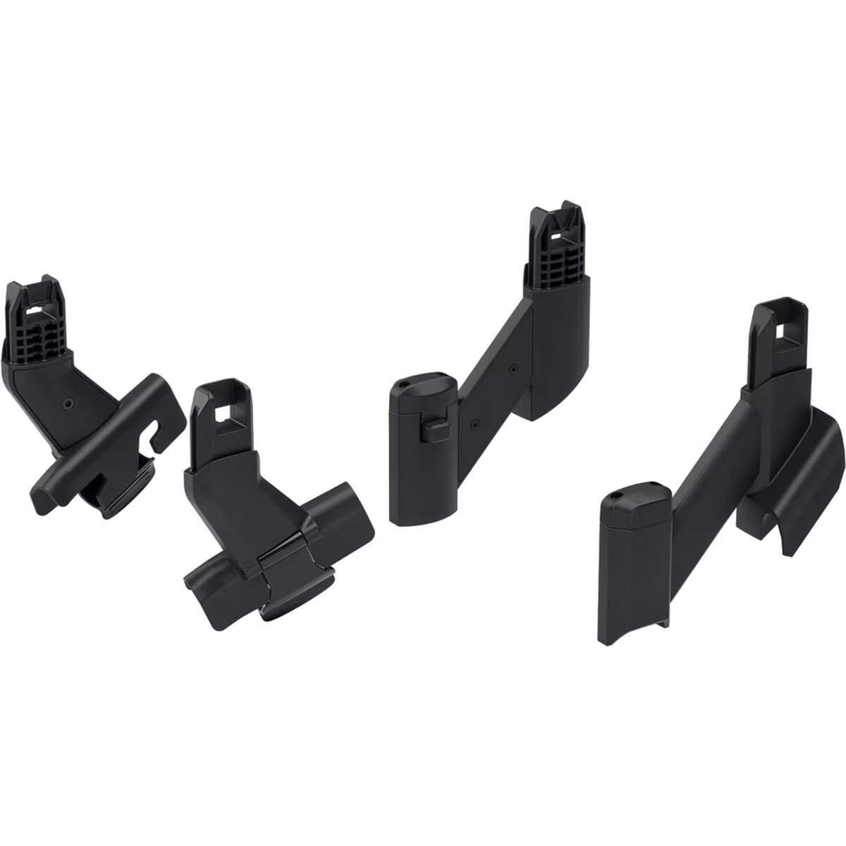 Four Thule Sleek Adapter Kit pieces in black plastic are displayed on a white background, each shown from different angles to highlight their connection points and slots for use with duo or sibling stroller configurations.