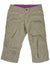 The Trekr Kapri is a pair of khaki women's knee-length capri pants, featuring front pockets, silver buttons, and a touch of purple lining visible inside the waistband.