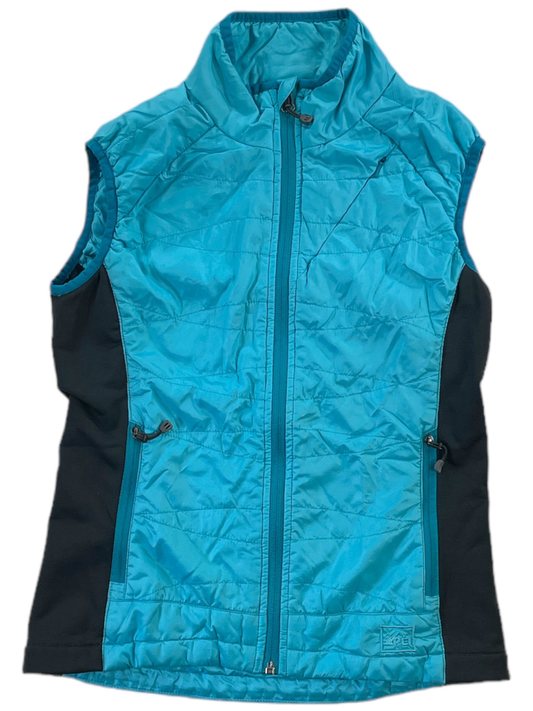 Revelcloud teal quilted vest with full-zip front, black side panels, and zip pockets.