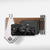 The Carbon Bundle Maple Board includes four carbon fiber-patterned packing cubes, two white towels with black trim, and three black luggage straps—perfect for organizing gear on a wooden shelf in your garage or by your ski and snowboard rack.
