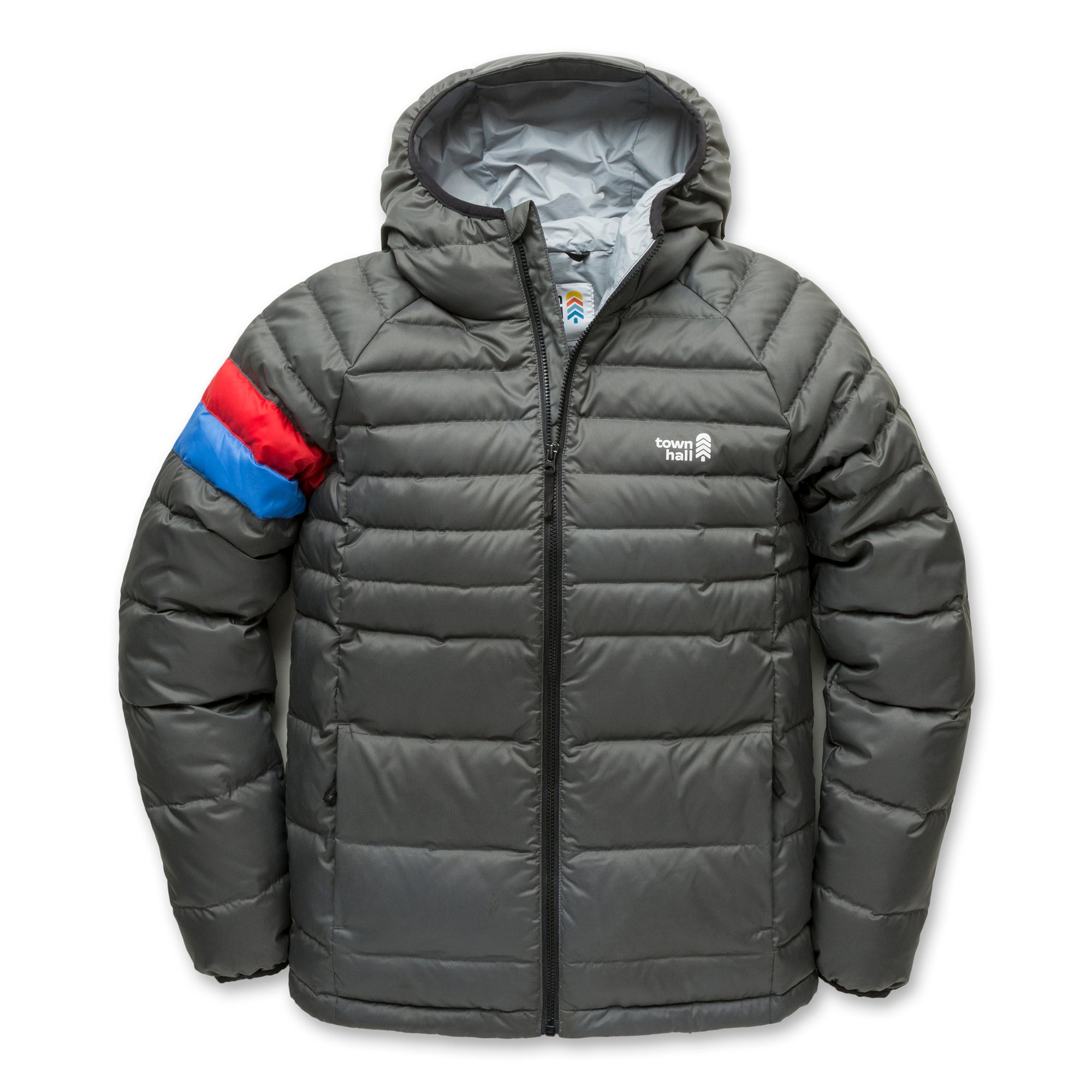 The Down Town Kids Puffy is a gray jacket with recycled down insulation, front zipper, left chest logo, and red-blue stripes on the upper right sleeve. This sustainable winter coat features horizontal quilted sections.