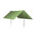 The Exped Tarp III Versa, a green rectangular entry-level tarp, is set up as an open-sided shelter using two front vertical poles and corner guy lines.