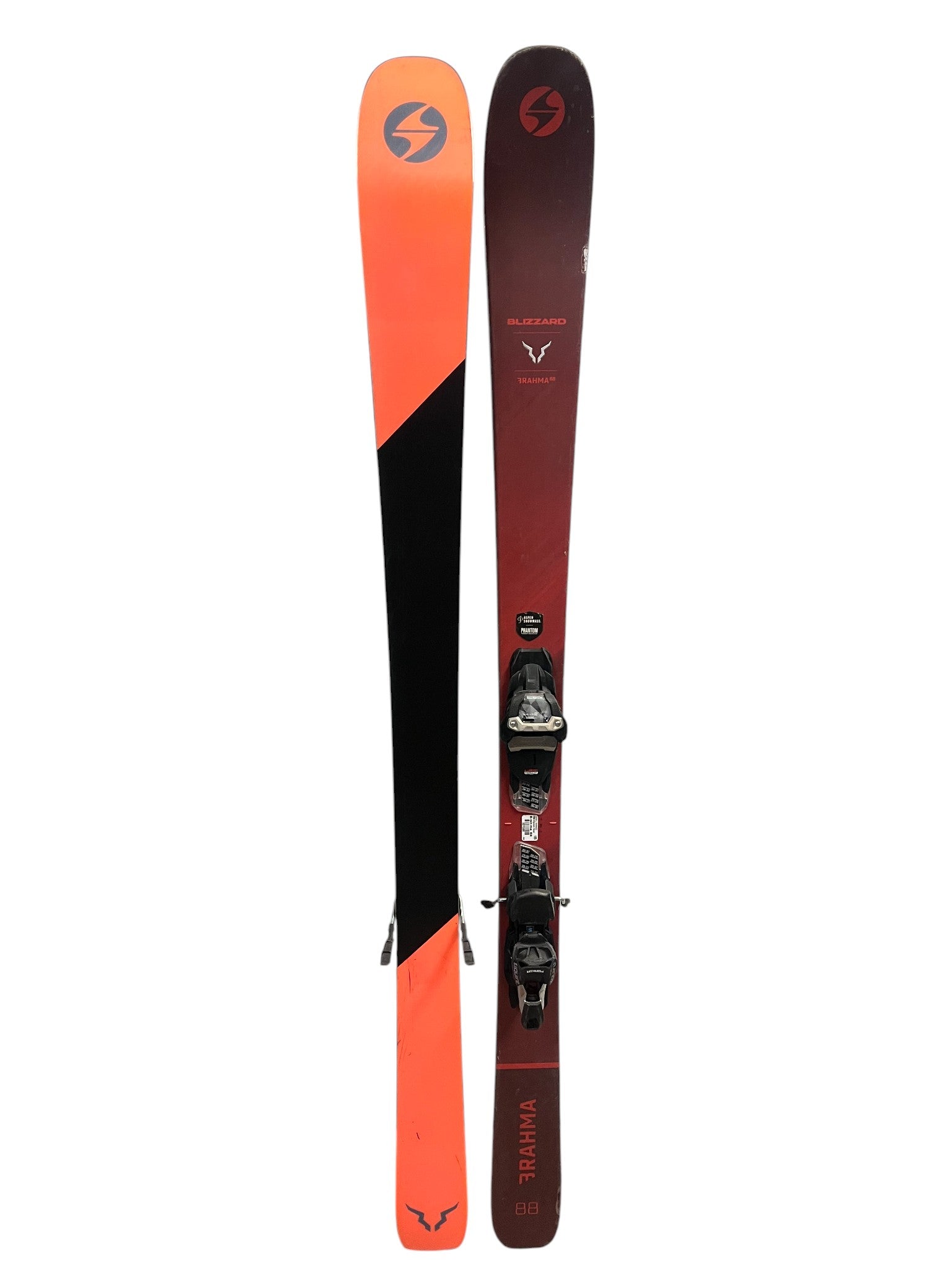The Blizzard Brahma 88 Skis with Marker Squire 11 Bindings (2022) are intermediate-advanced all-mountain skis with a red-orange gradient design, bindings on one ski, and visible brand logos and graphics on both.