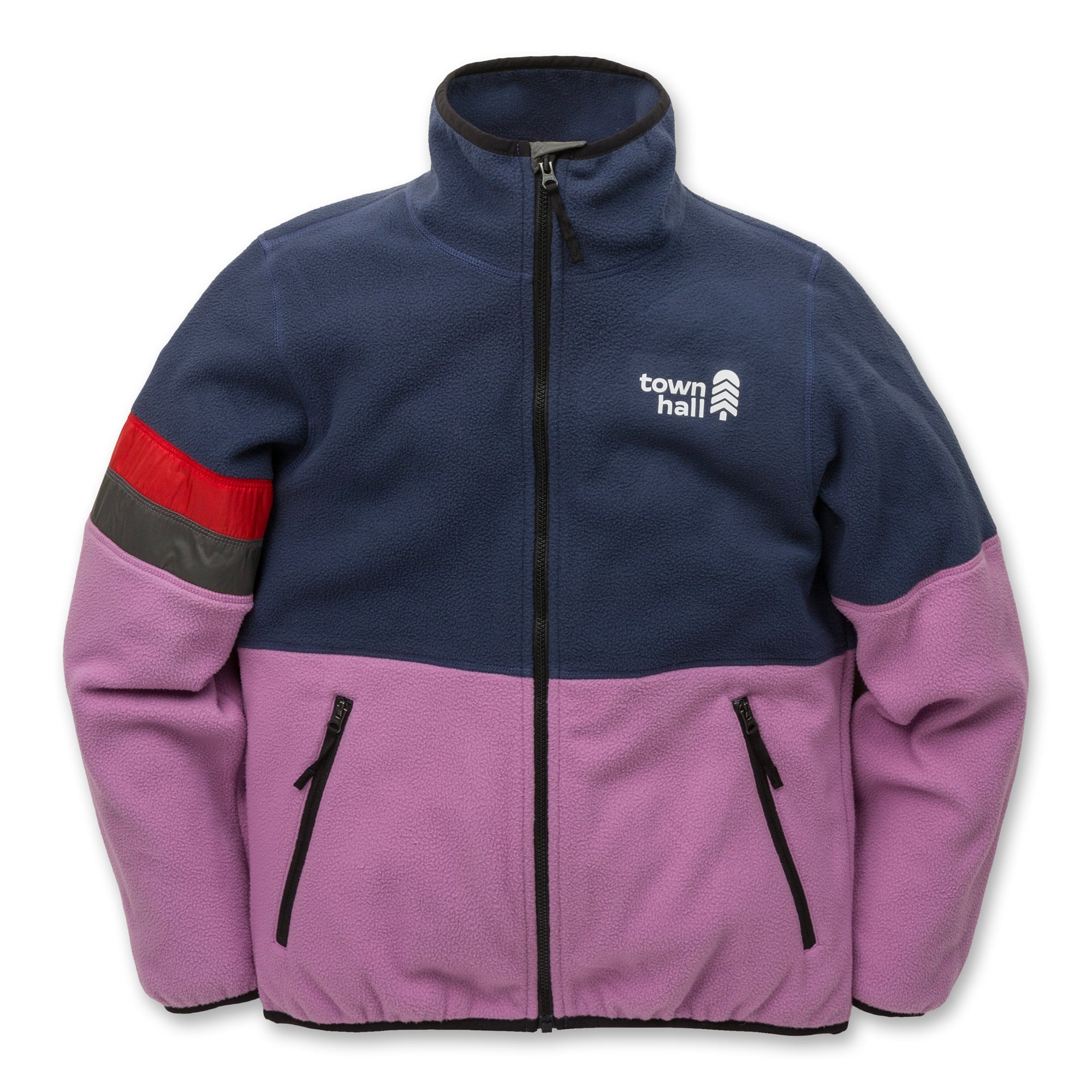 The Midtown Fleece Jacket is a kids’ fleece made from recycled polyester, featuring a navy blue top, light purple bottom, black zipper and pockets, one sleeve with red and gray stripes, town hall graphic, and a small chest logo.