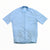 Laid flat on a white background, the Rapha Men’s Core Jersey in light blue features short sleeves, a full front zipper, and the Rapha logo on the left chest.
