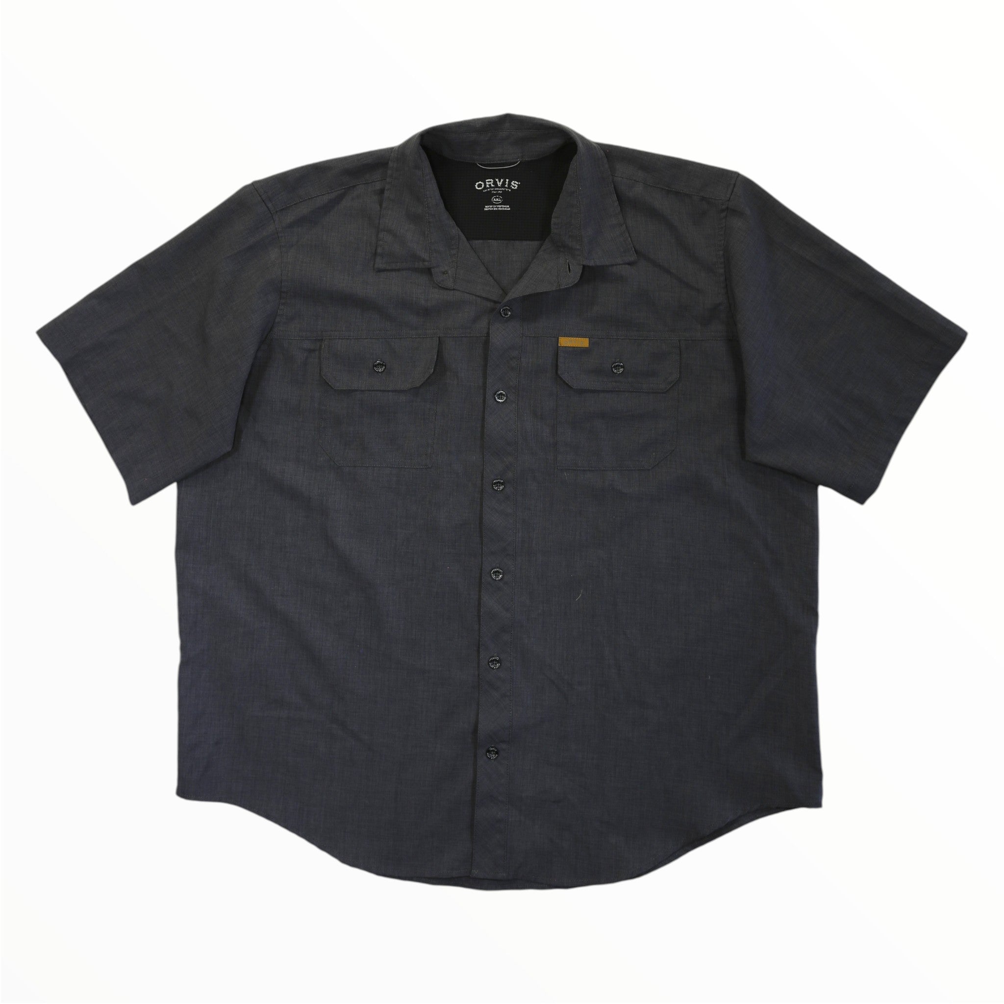 Men's short-sleeve woven tech shirt, dark button-front with chest pockets.