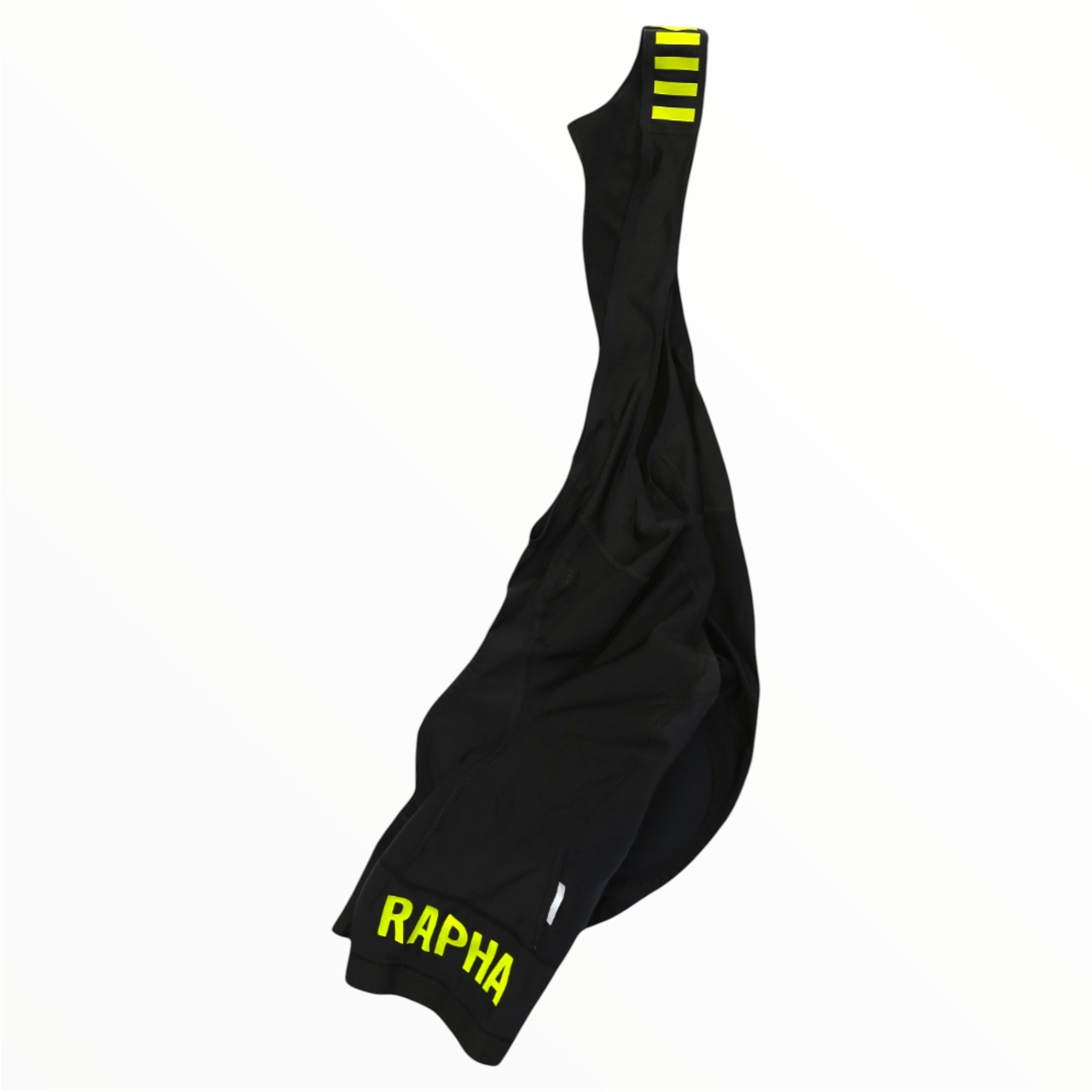 The Rapha Mens Pro Team Winter Bib Shorts feature "RAPHA" in yellow on the leg and three yellow stripes on one shoulder strap, shown against a white background—ideal cycling apparel for men during winter rides.