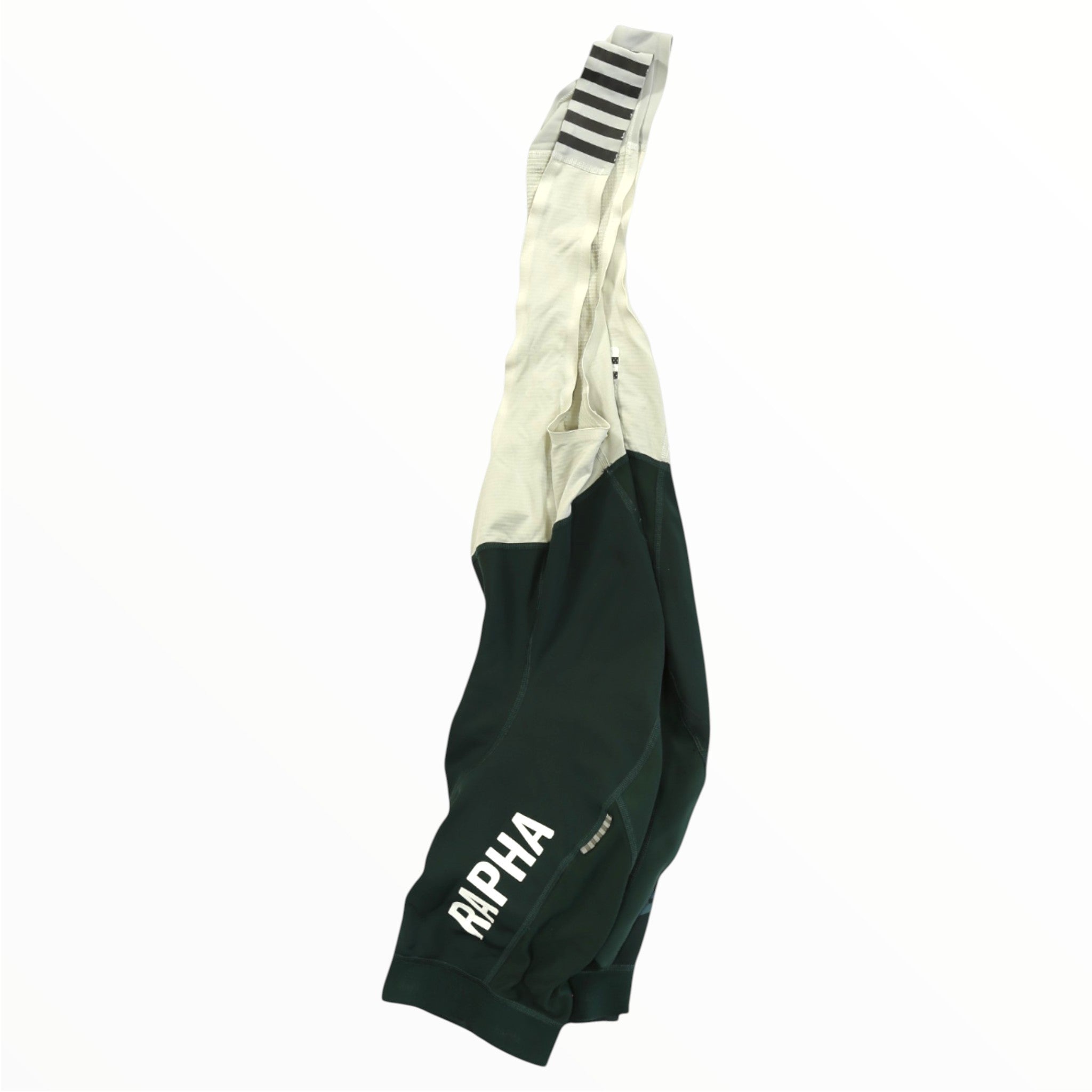 The Rapha Mens Pro Team Winter Bib Shorts, dark green and white with white RAPHA on the lower leg, are displayed hanging against a plain white background.