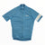 A blue Rapha Mens Core Jersey featuring short sleeves, a front zipper, a white Rapha logo on the chest, and a distinct white band on the left sleeve, showcased against a flat white background—an essential addition to men’s cycling apparel.