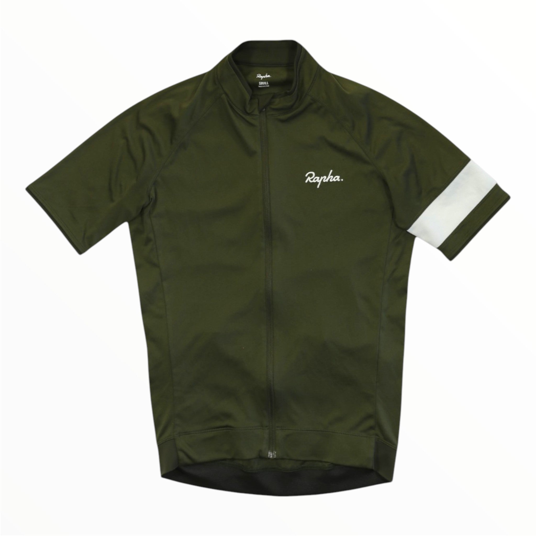 The Rapha Men’s Core Jersey is a short-sleeved, olive-green cycling jersey featuring a full front zipper, a white armband on the left sleeve, and the Rapha logo on the left chest—making it an essential piece of men’s cycling apparel.