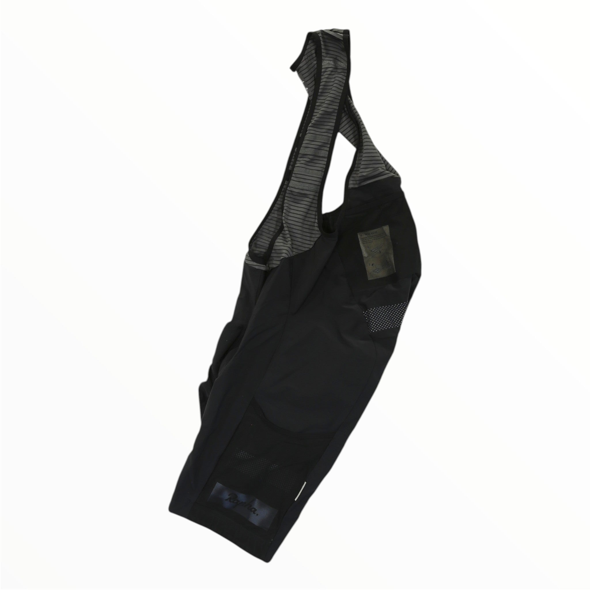 Rapha Mens Cargo Bib Shorts by Rapha, featuring mesh shoulder straps, are displayed laid flat on a white background. These cycling bibs offer practical pockets and highlighted stitching details, with both front and side views shown.