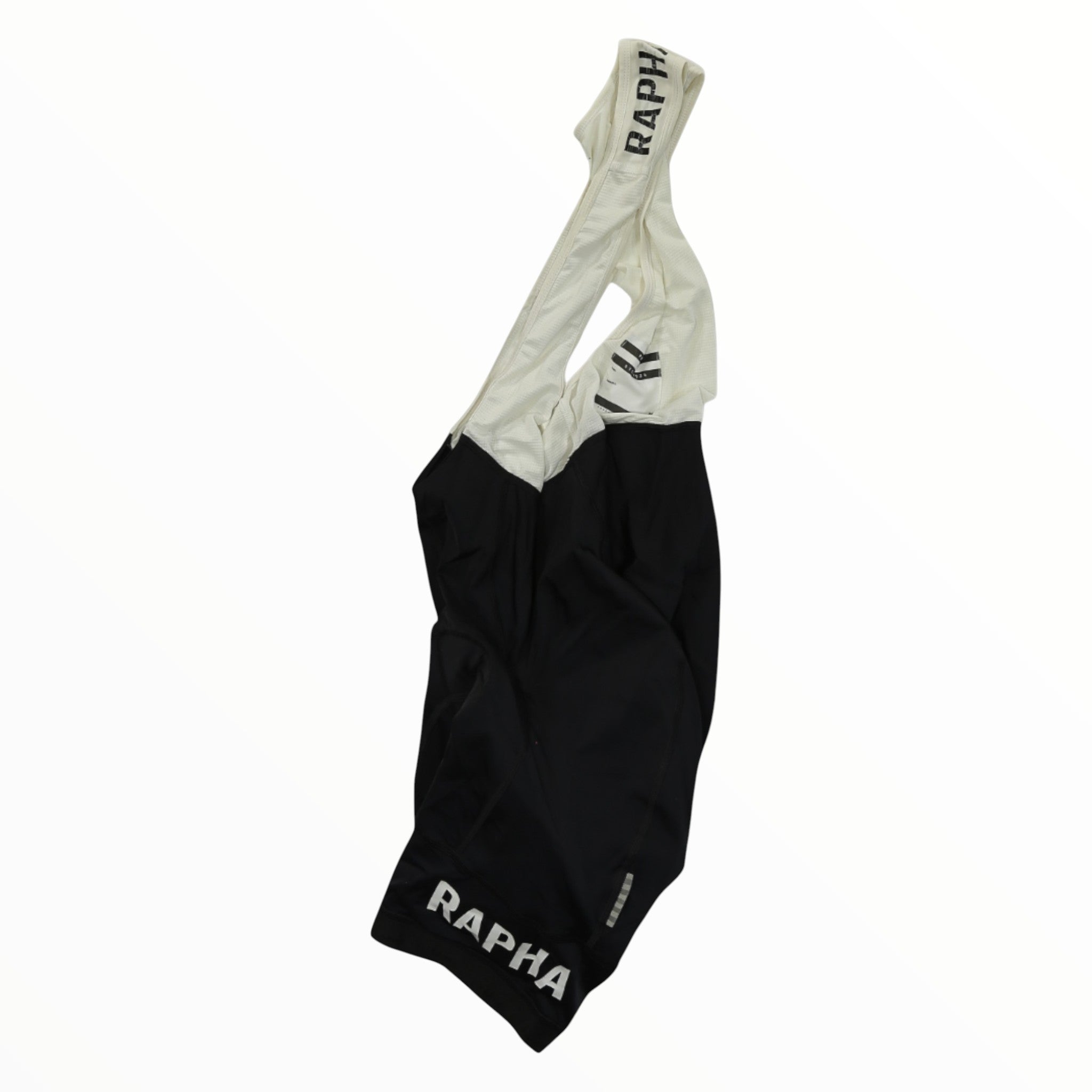 Men's cycling bib shorts, white upper and black lower; Rapha logo on leg cuff.