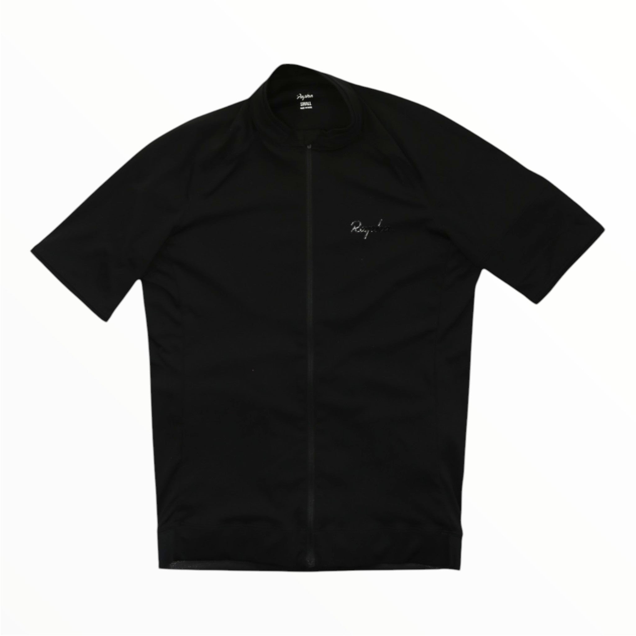 Displayed on a plain white background, the Rapha Mens Core Jersey is a black, short-sleeve men’s cycling jersey featuring a front zipper and subtle white Rapha branding on the left chest.