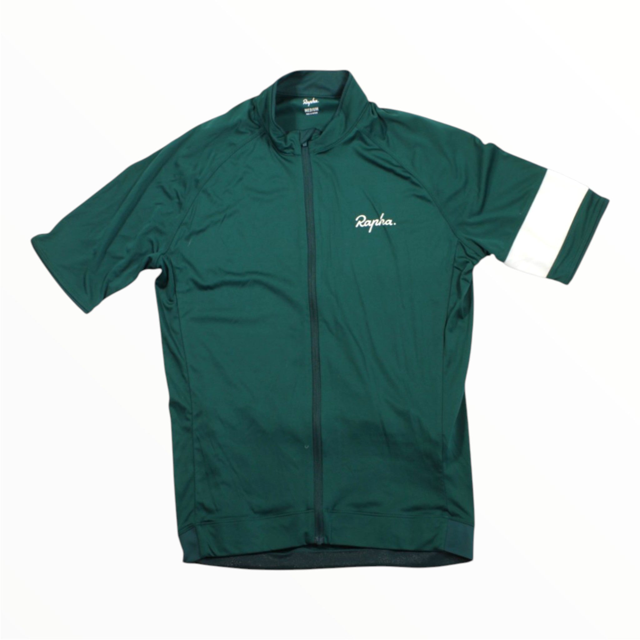 A Rapha Mens Core Jersey—short-sleeve and dark green—features a full front zipper, a white Rapha logo on the chest, and a white band around the upper left sleeve. This essential men’s cycling apparel by Rapha is shown laid flat on a white background.