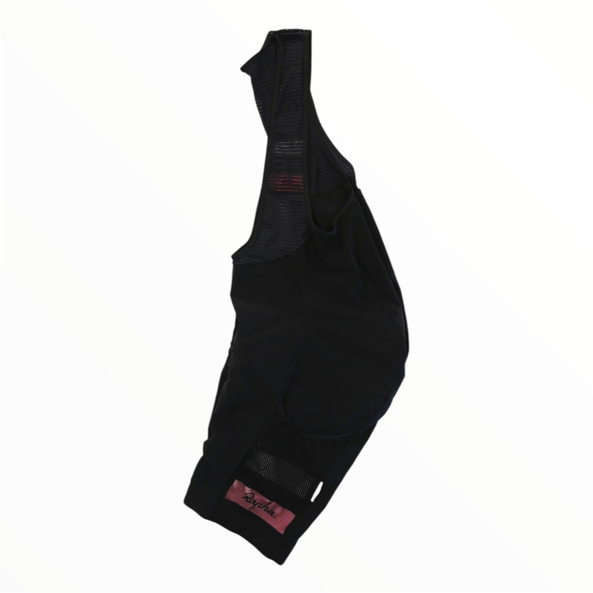 Black Rapha Mens Cargo Bib Shorts with mesh straps and a visible Rapha logo tag, displayed flat on a white background. Designed for comfort by Rapha, these bib shorts feature an award-winning chamois.