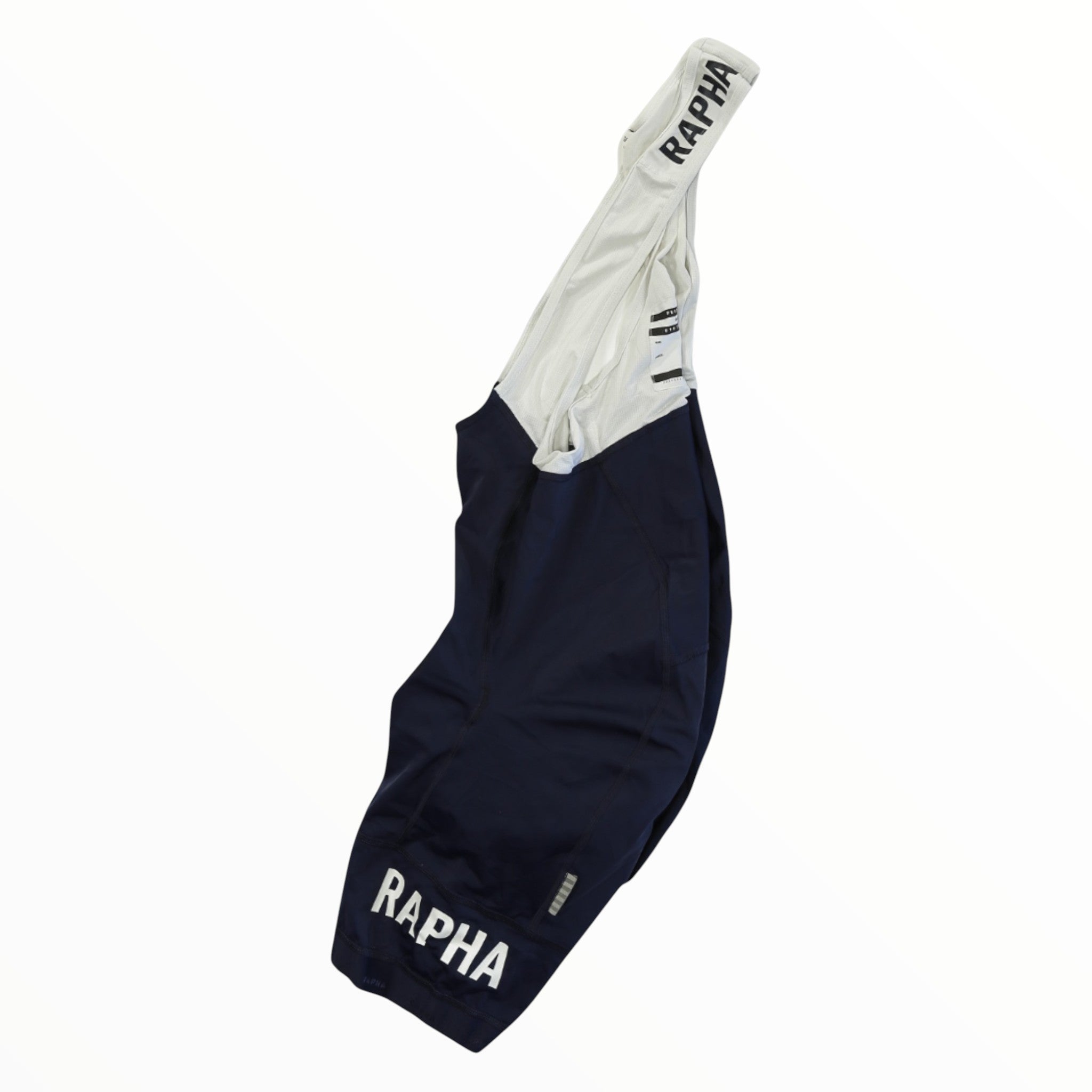 Men's cycling bib shorts with light gray straps and navy legs, Rapha logo on hem.