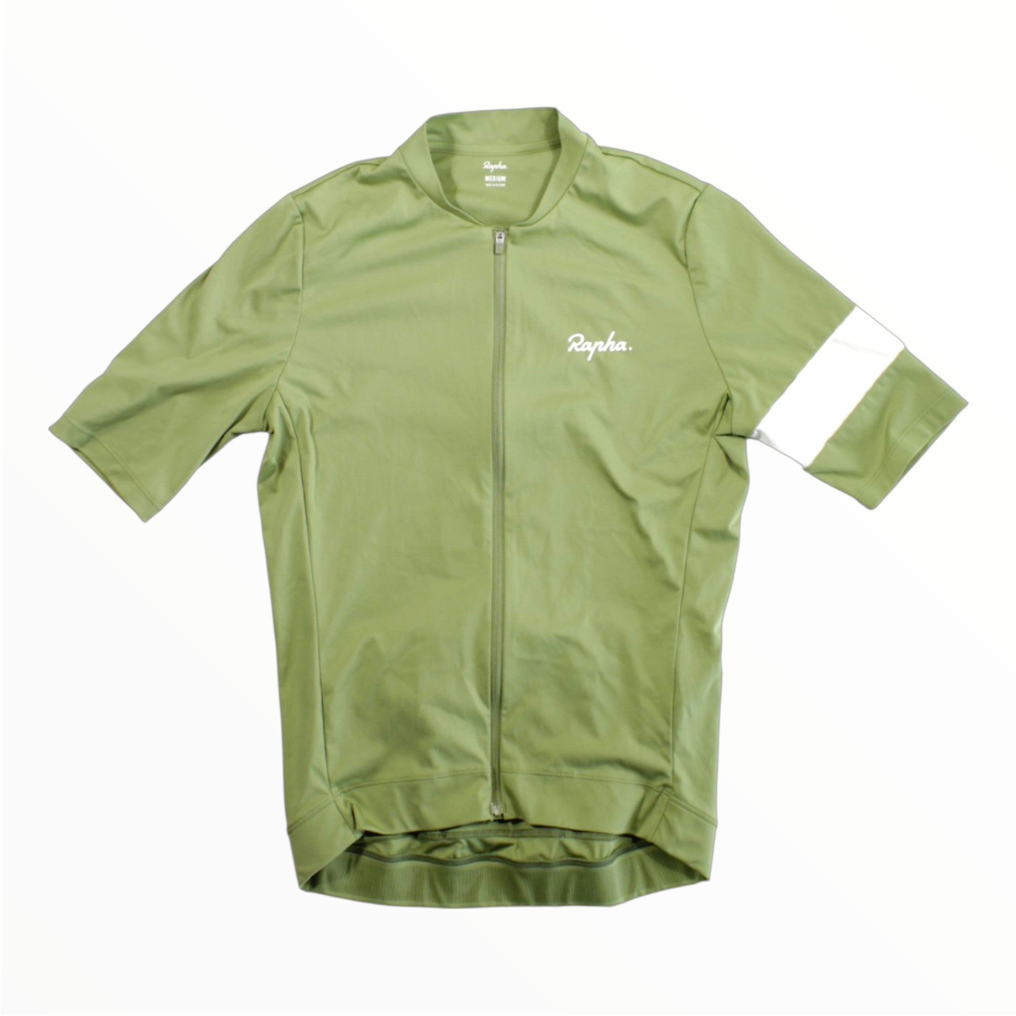 The Rapha Mens Core Jersey in light green features short sleeves, a full-length front zipper, and a white Rapha logo on the chest. A horizontal white stripe accents the left sleeve. Laid flat on a white background, this high-quality cycling jersey by Rapha is designed to deliver comfort and performance for men.