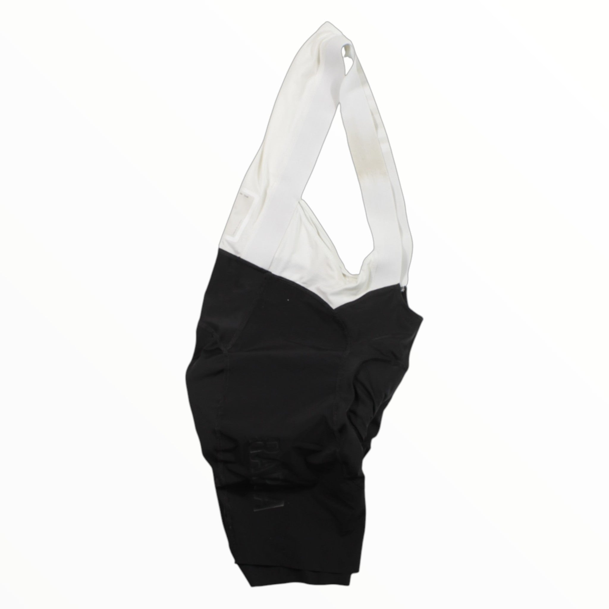 Men's cycling bib shorts with white straps, black body, and Rapha branding on leg.