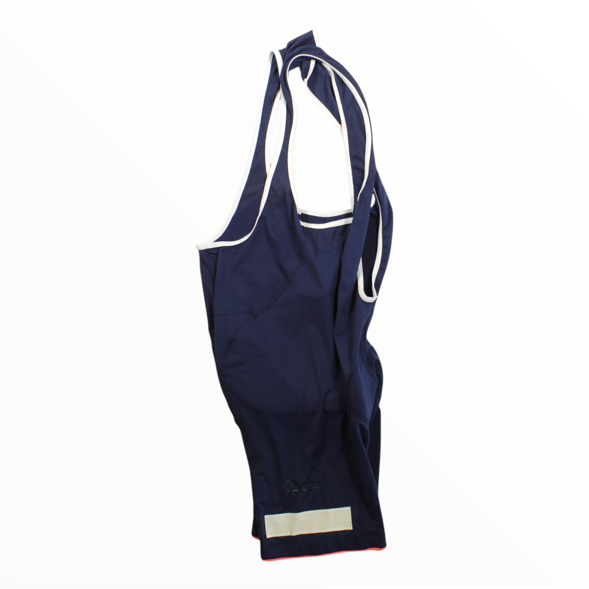 Navy cycling bib shorts with white contrast trim and red logo accent at leg hem