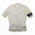 The Rapha Pro Team Flyweight Jersey is an ultralight, short-sleeve white cycling jersey featuring a front zipper and a left black armband with RAPHA in bold white letters.