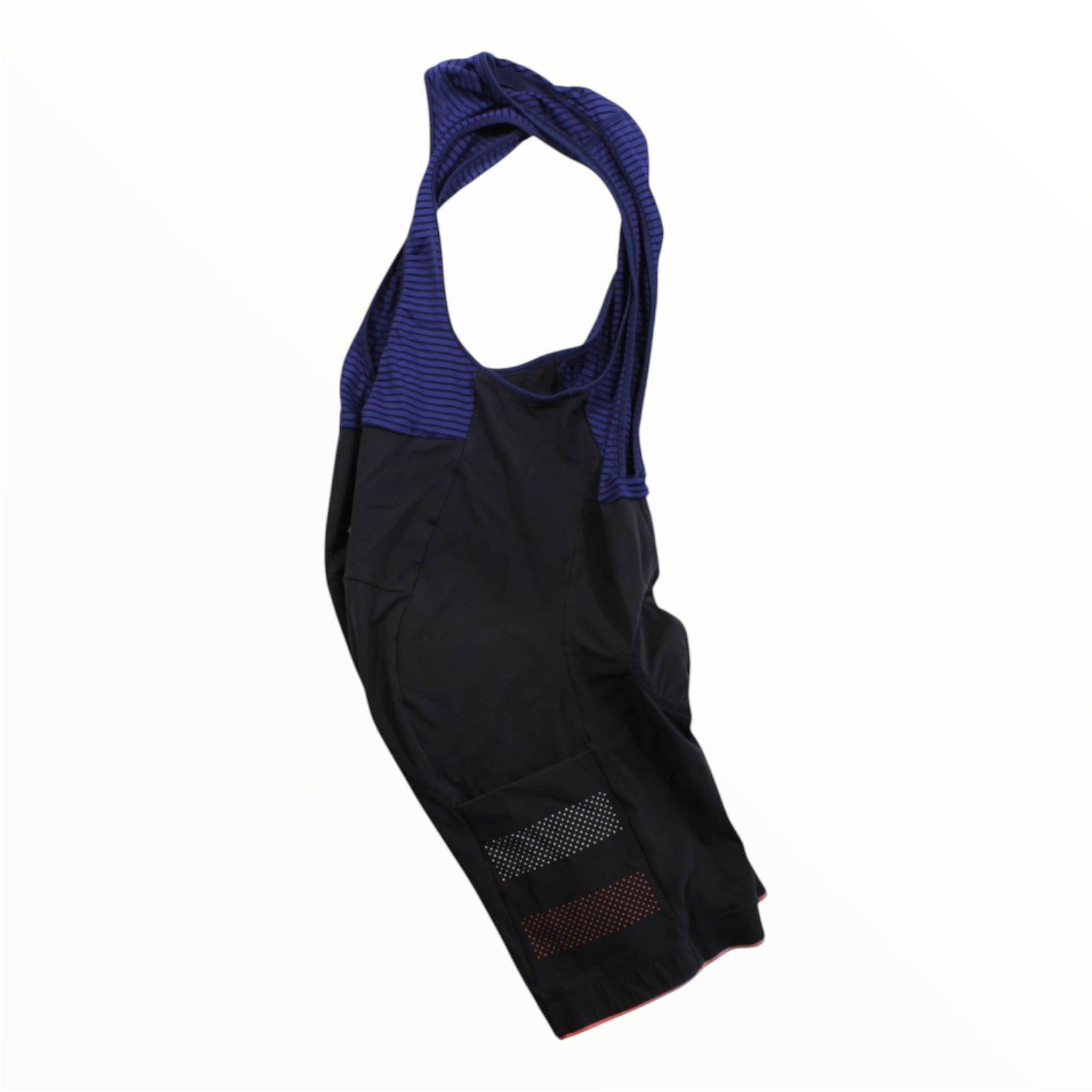 Black cycling bib shorts with blue bib straps and reflective geometric patch on leg