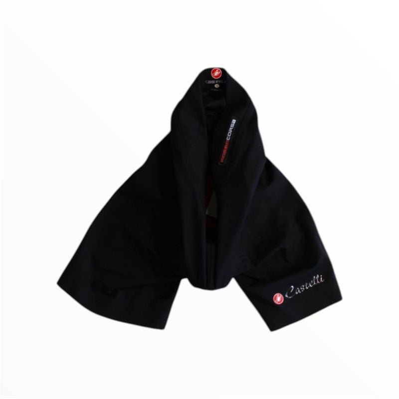The Castelli Women's Rosso Corsa Cycling Shorts with Pad, ideal for road cycling, feature the Castelli logo and branding on a tag with embroidered text, shown on a plain white background.
