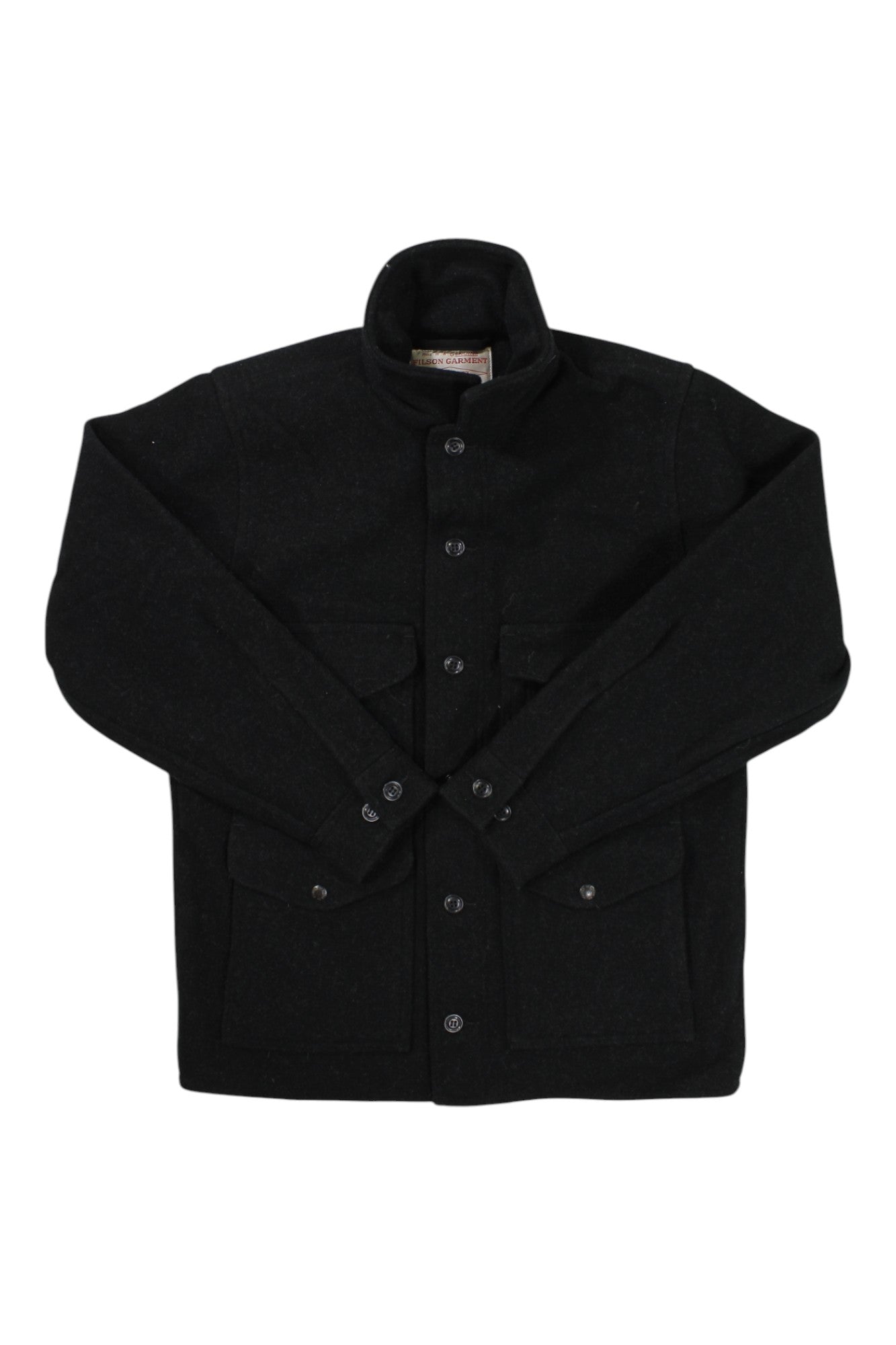 The Filson Men's Mackinaw Cruiser Jacket, in black wool with a high collar and four front pockets, is shown laid flat on a white background.