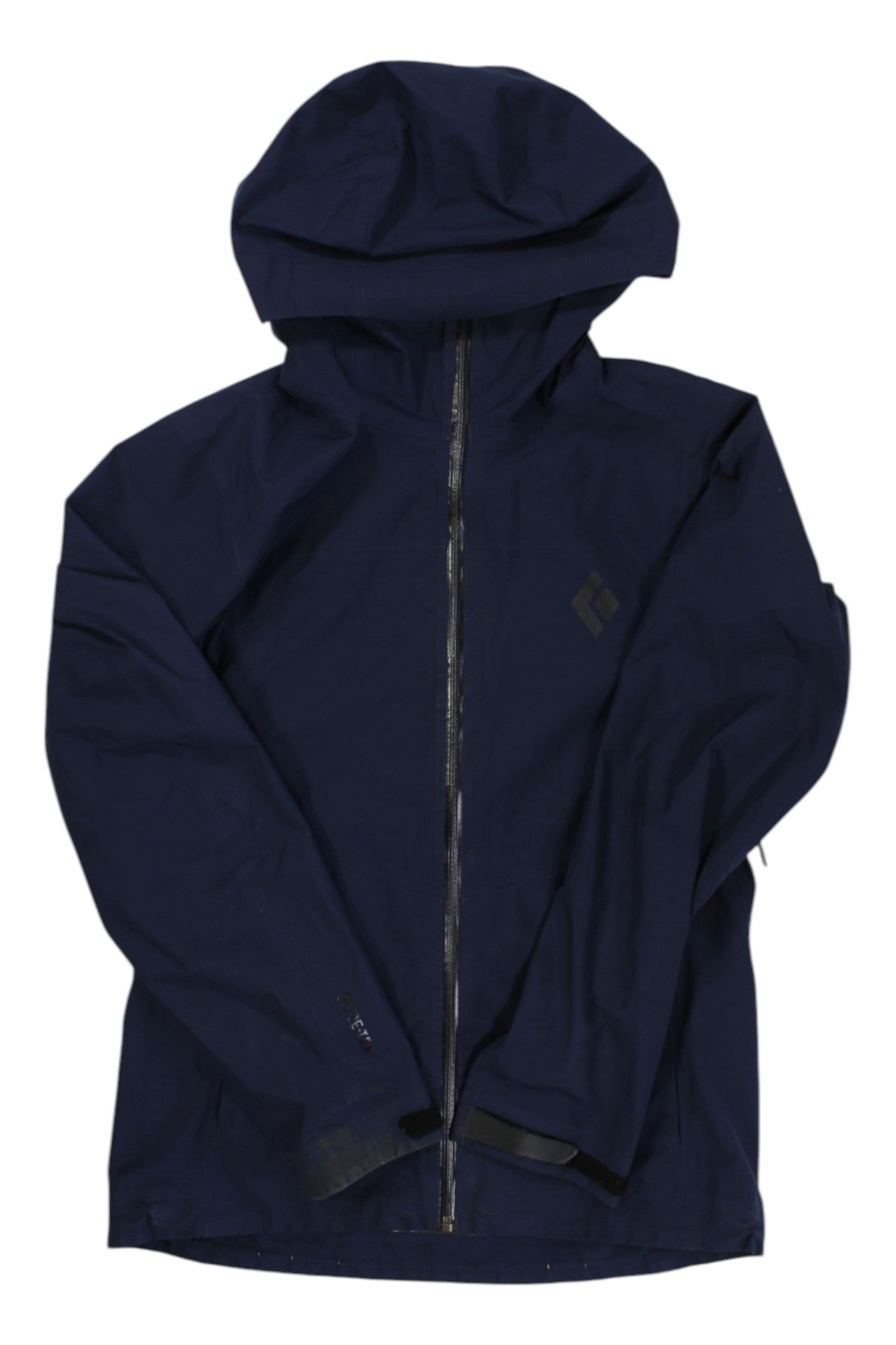 The Womens Liquid Point Shell is a navy blue GORE-TEX jacket with a front zipper, long sleeves, and a subtle left chest logo. This lightweight, waterproof shell keeps you dry in any weather—perfect for outdoor activities.