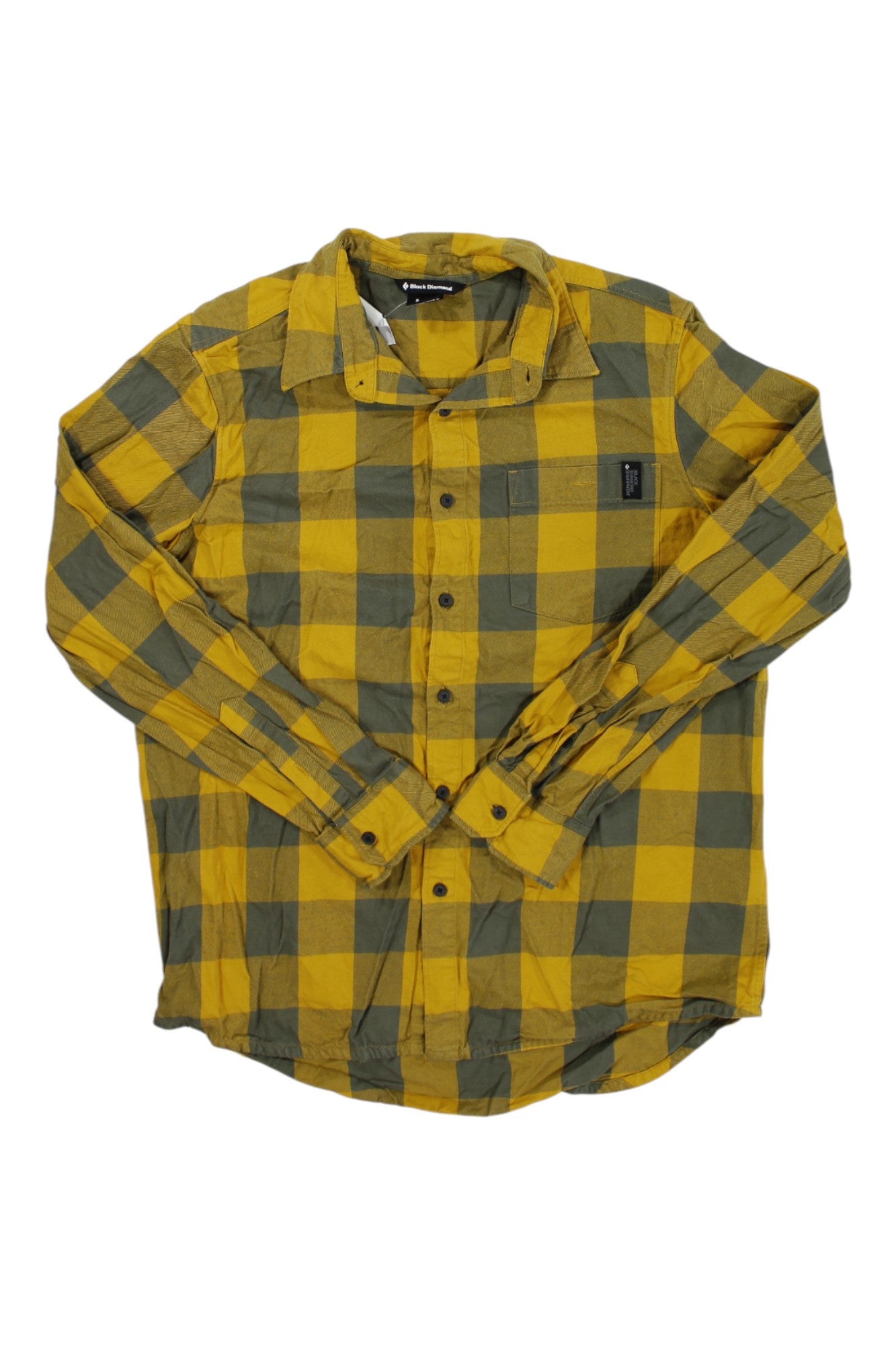 The Black Diamond Men's Project Flannel Shirt is a yellow and olive green plaid, long-sleeve button-up with a collar and chest pocket, crafted from soft organic cotton and shown laid flat on a white background.