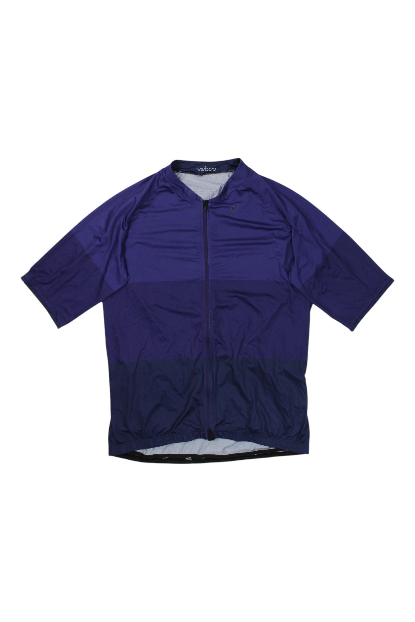 The VELOCIO MENS TRICOLOR SE JERSEY is a breathable, short-sleeved cycling top in purple and navy with a zip-up front, shown laid flat against a white background.