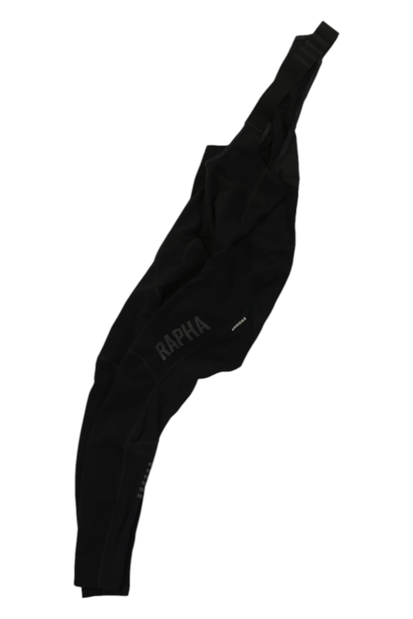 A pair of black Rapha Mens Pro Team Winter Tights with Pad II by Rapha is laid flat on a white background, highlighting the straps and intricate leg details of these premium winter cycling tights.