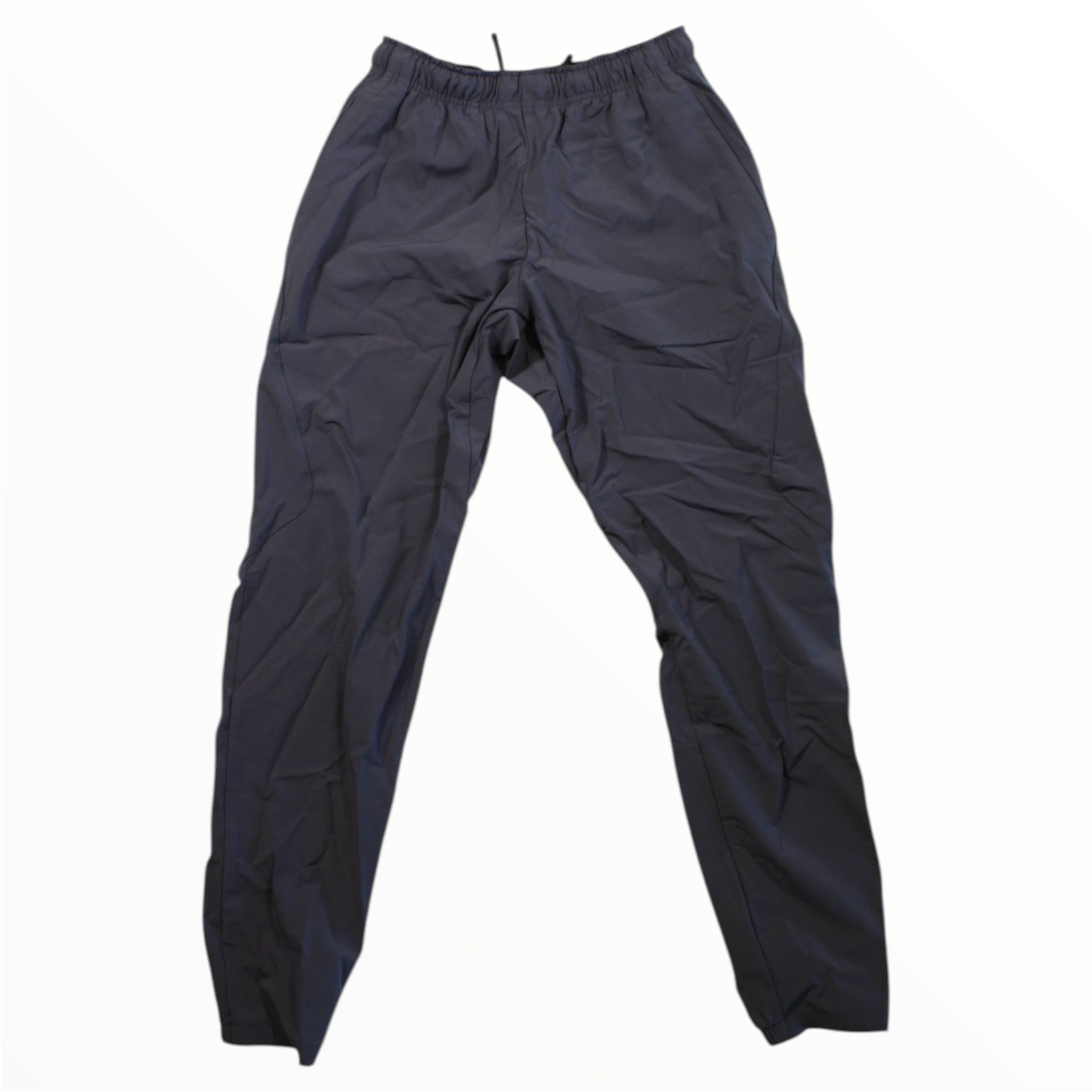 The Rapha Mens Active Joggers are dark navy blue, lightweight, quick-drying pants with an elastic waistband—ideal for outdoor activities. Shown laid flat on a white background.